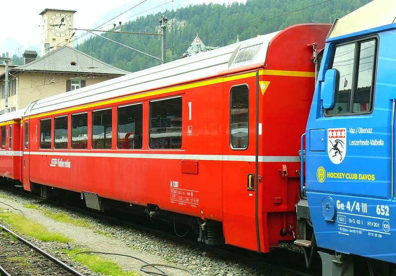 RhB - A 1281 am 19.07.2013 in St.Moritz - 1.Klasse Personenwagen - Einheitspersonenwagen Typ IV - �bernahme 19.07.1993 - SWP - Fahrzeuggewicht 18,00t - Sitzpl�tze 30 - L�P 18,50m - zul�ssige Geschwindigkeit 90 km/h - �2=18.02.2011 - Logo RhB in r�toromanisch - Hinweis: Kennzeichnung gelbes Dreieck mit wei�en Punkt - Abbruch 22.01.2015 nach Ungl�ck Schynschlucht
