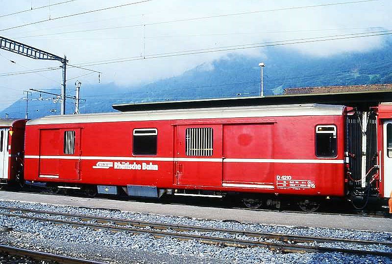 RhB - D 4210 - Gep�ckwagen am 19.06.1999 in Landquart - �bernahme 14.01.1961 - FFA/SIG - Fahrzeuggewicht 14,00t - Zuladung 8,00t - L�P 13,74m - zul�ssige Geschwindigkeit 90 km/h.-  �2=11.03.1994 - RhB-Logo italienisch. Hinweis: jetzt mit Bremszahnrad durchstrichen, d�nne Fahrzeugnummer
