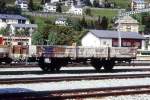 RhB - Kk-w 7383 am 28.08.1996 in Samedan - Niederbordwagen 2-achsig mit 1 offenen Plattform - Baujahr 1913 - Louv - Gewicht 5,40t - Zuladung 12,50t - L�P 7,79m - zul�ssige Geschwindigkeit 60/R km/h -