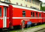 DS 4221 - Gep�ckwagen am 19.07.2013 in St.Moritz - �bernahme 14.03.1980 - SWS/SWP - Fahrzeuggewicht 18,00t - Zuladung 4,00t - L�P 13,74m - zul�ssige Geschwindigkeit 90 km/h.- RhB-Logo Graub�nden in
