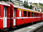 RhB - A 1266 am 30.07.2010 in St.Moritz - 1.Klasse Personenwagen - Einheitspersonenwagen Typ II - �bernahme 21.12.1977 - FFA/SWP - Fahrzeuggewicht 17,00t - Sitzpl�tze 36 - L�P 18,50m - zul�ssige