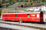 RhB - Z 13094 am 22.10.1998 in Scuol - Postwagen 4-achsig mit 1 offenen Plattform - �bernahme: 27.06.1967 - SWS - Fahrzeuggewicht 17,00t - Zuladung 9,00t - L�P 16,87m - zul�ssige Geschwindigkeit = 90